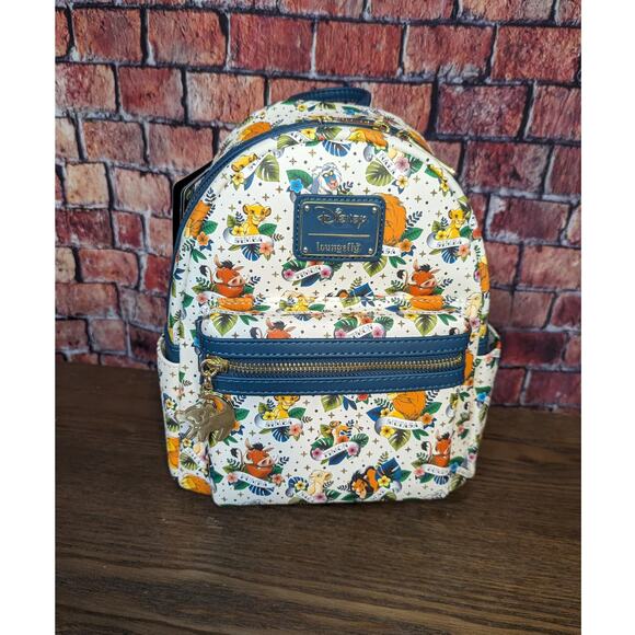 Loungefly Handbags - NWT Loungefly Disney Exclusive LF Lion King Tattoo Mini BagPack